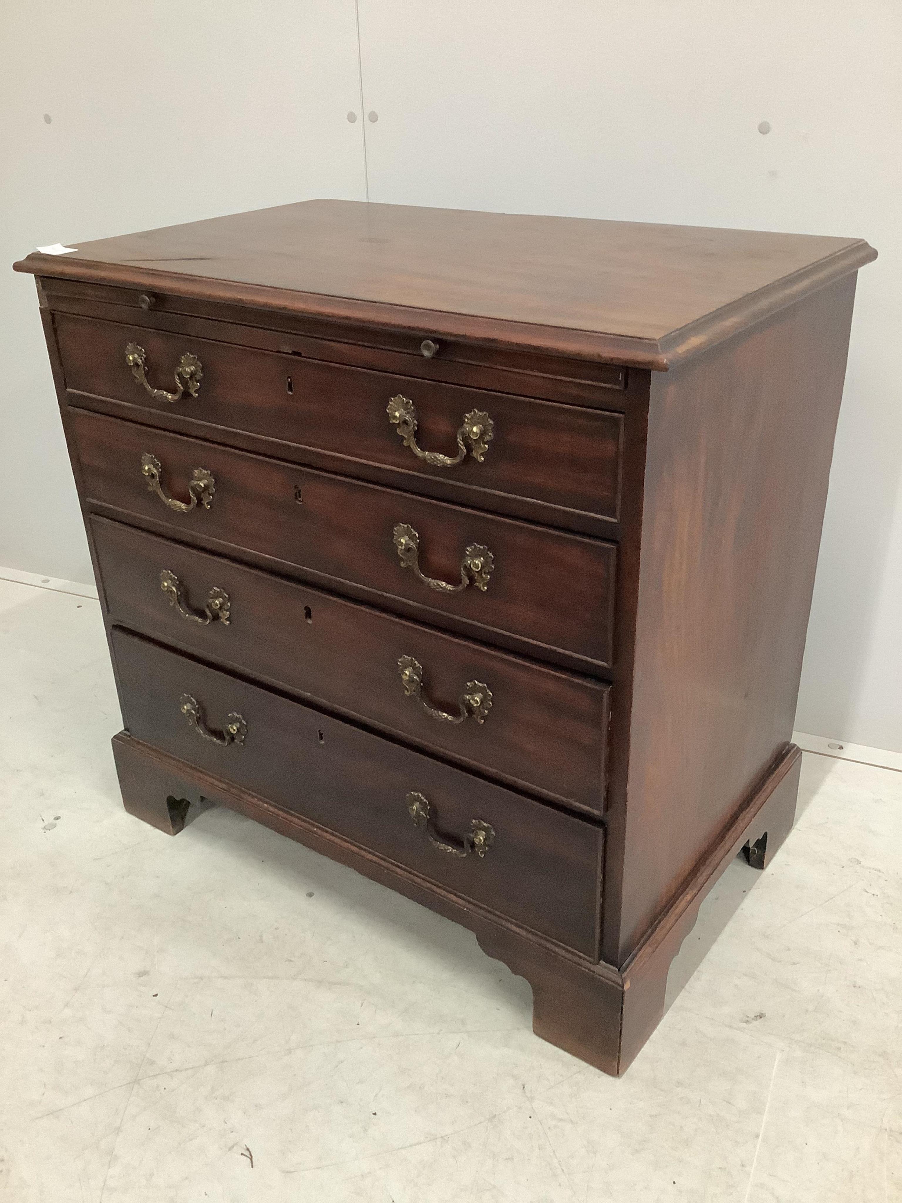 A George III mahogany chest with brushing slide, width 83cm, depth 51cm, height 81cm. Condition - fair